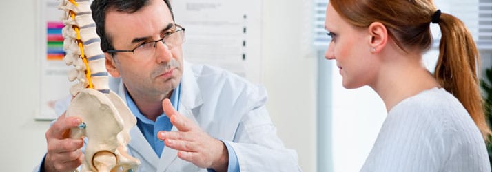 Chiropractic Wilmington DE Doctor Explaining Spine Chiropractic Wilmington DE Doctor Explaining Spine